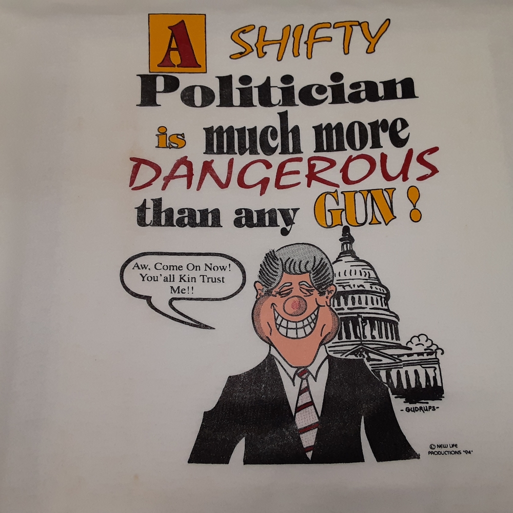 Slick Wille White Short Sleeve Tee with Political Quote About Guns